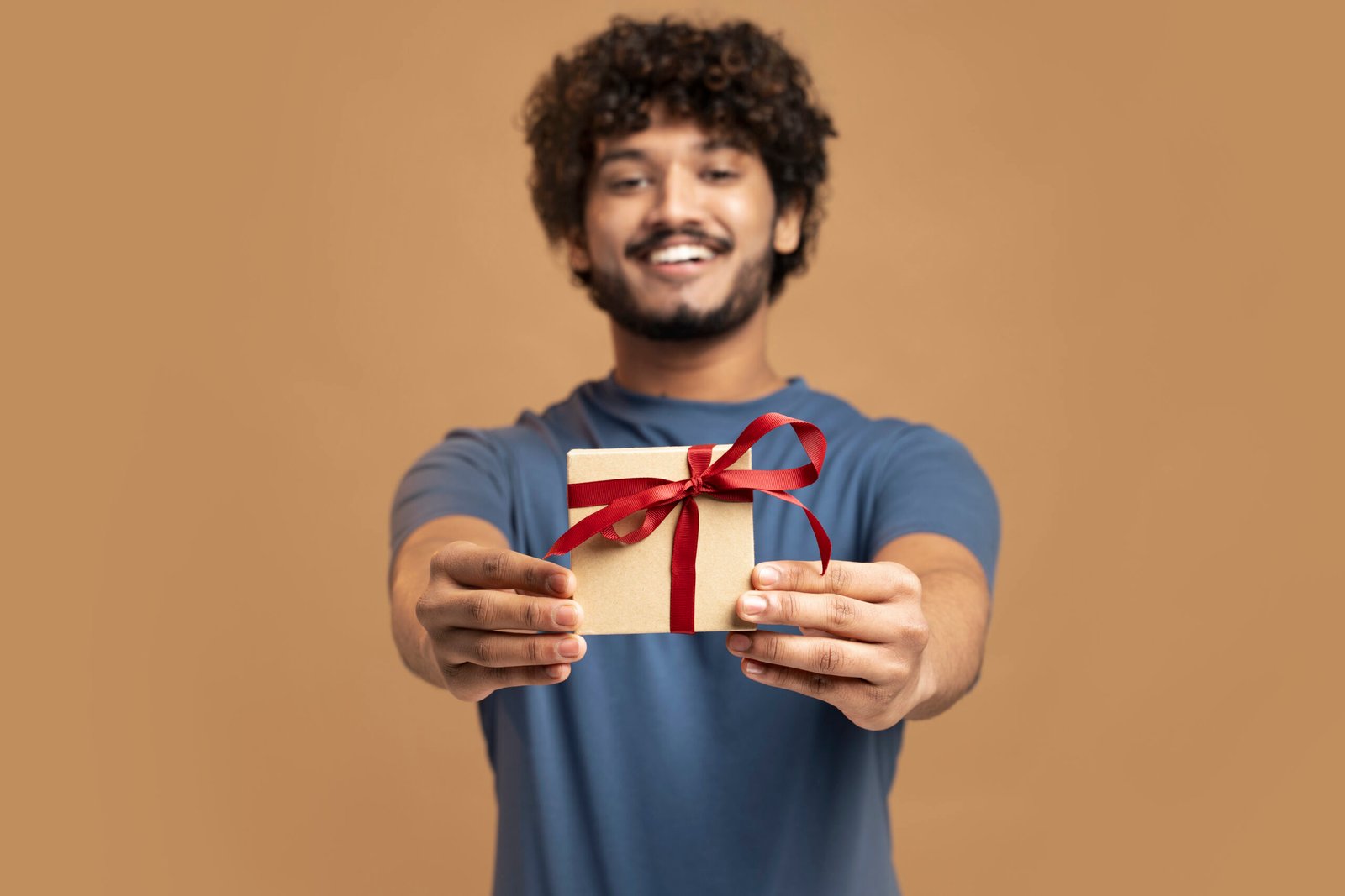 man-wearing-t-shirt-gesturing